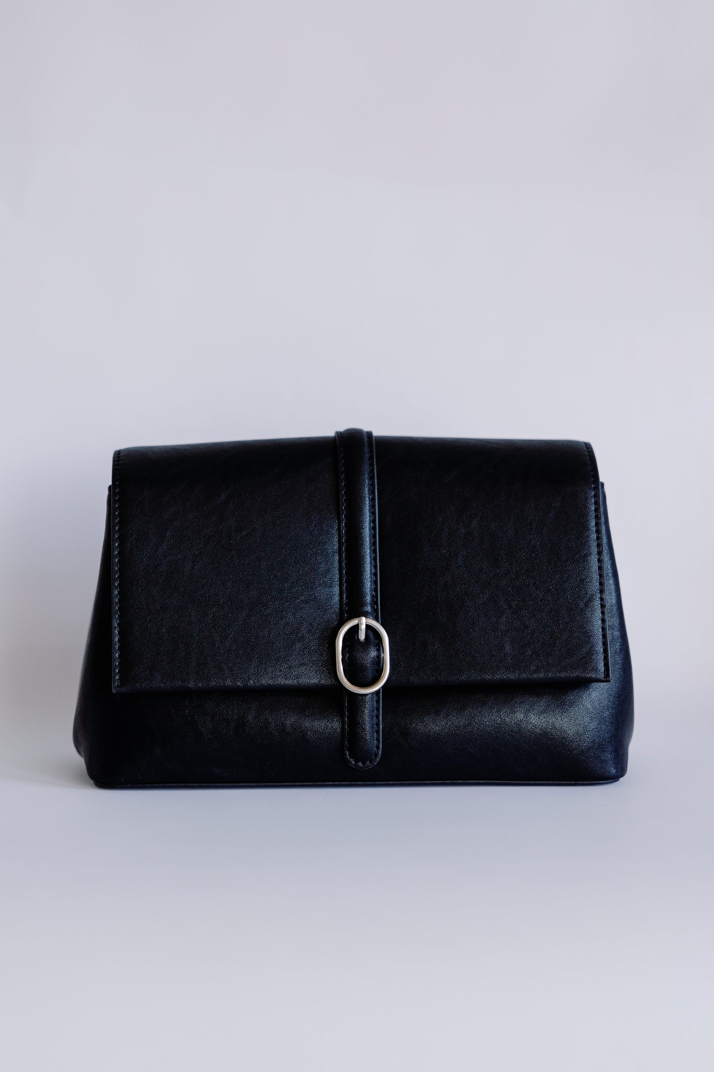 The O Buckle Clutch