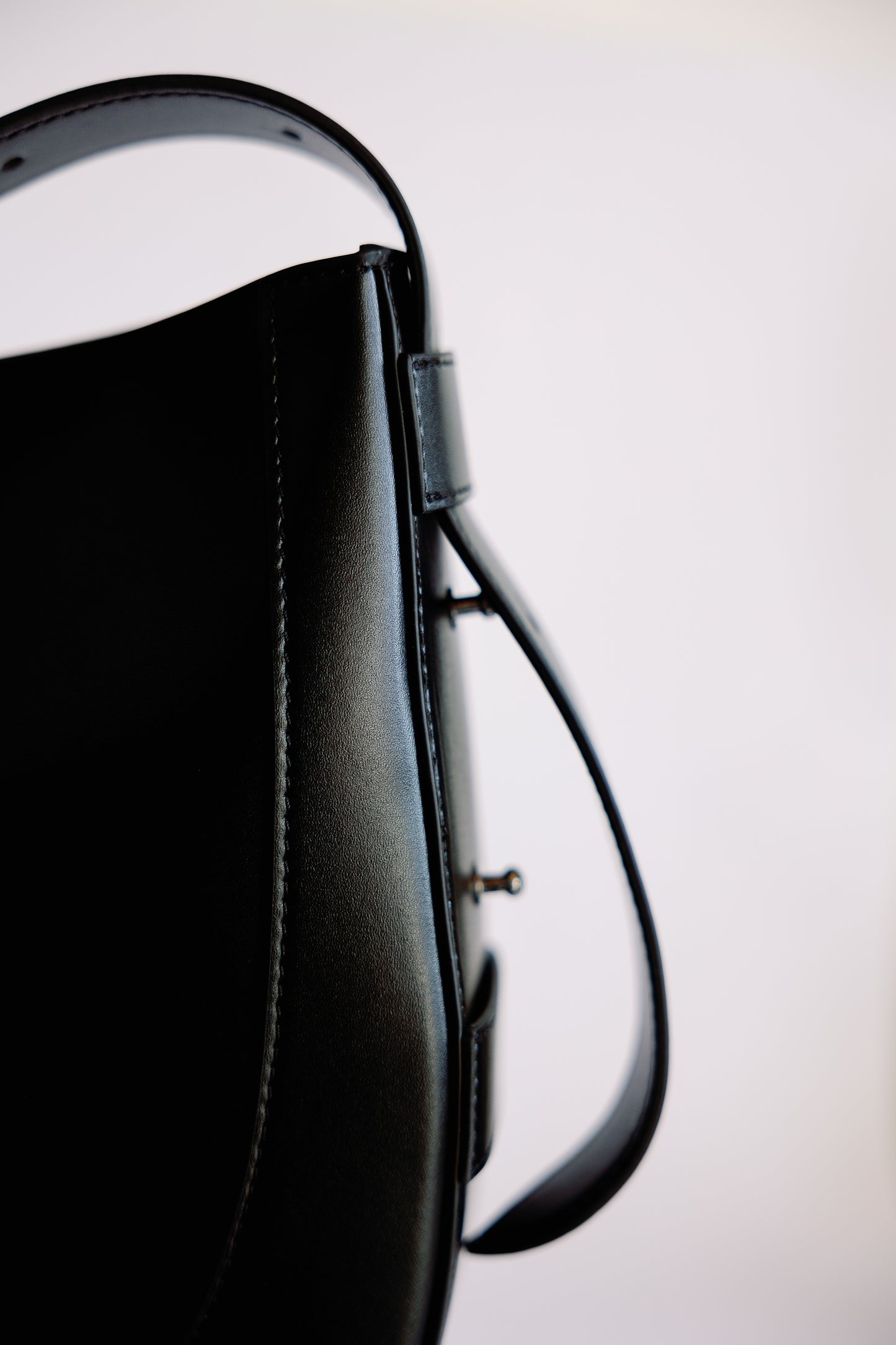 The Curved Saddle Bag