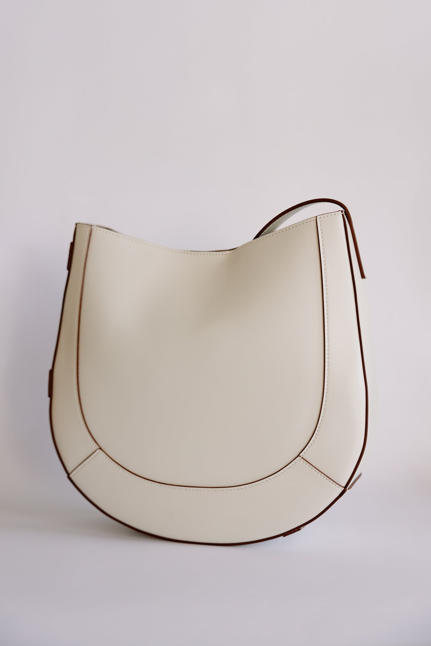 The Curved Saddle Bag